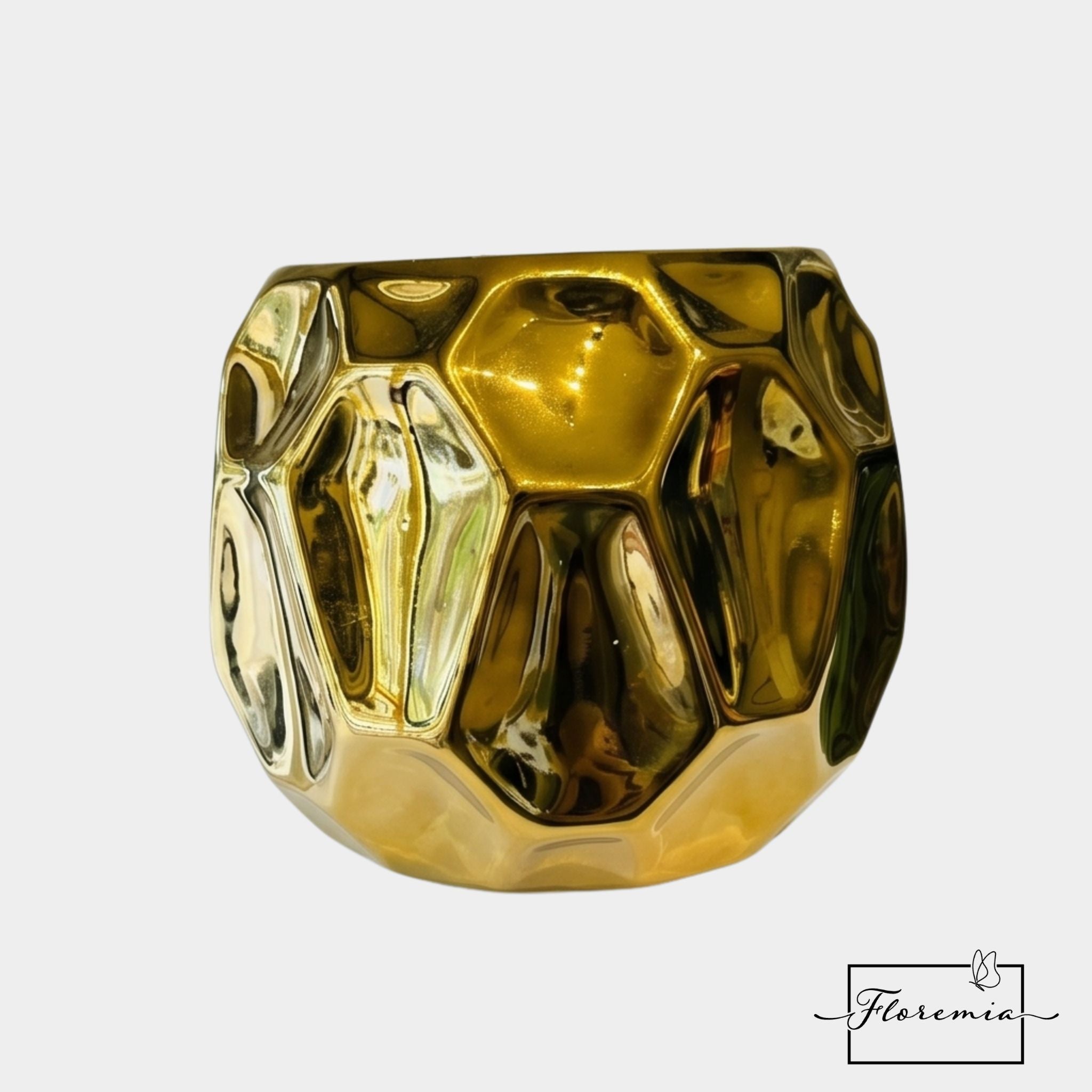 Macetero de cerámica dorado